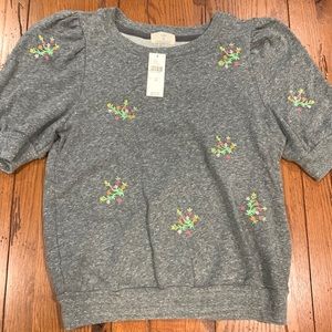 Anthropologie grey sweater top with flower bursts